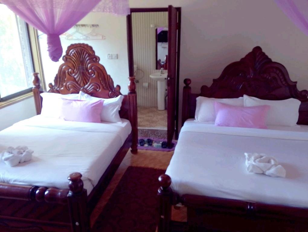 Discovery Courts Hotel Энтеббе Экстерьер фото
